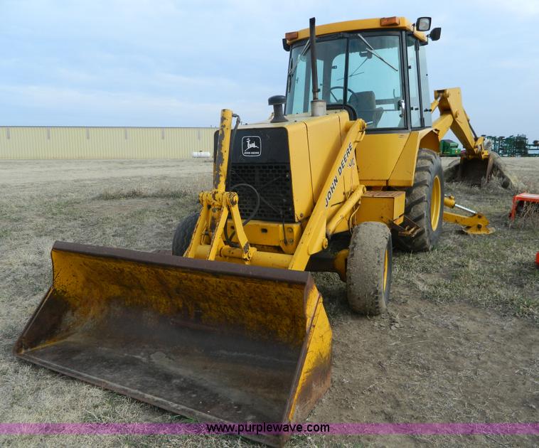 image for item D6116 1986 John Deere 210C backhoe