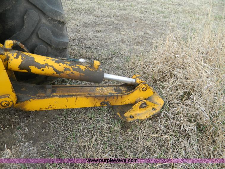 image for item D6116 1986 John Deere 210C backhoe