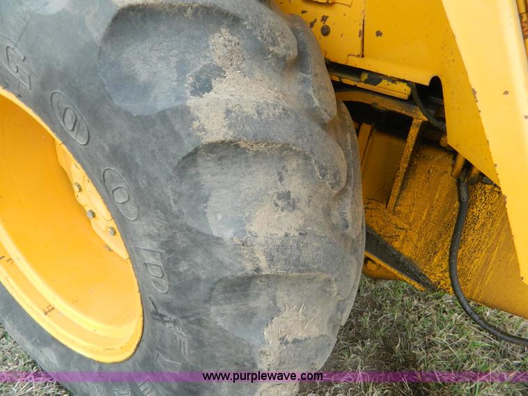 image for item D6116 1986 John Deere 210C backhoe