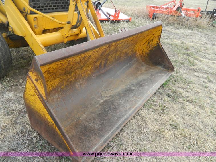 image for item D6116 1986 John Deere 210C backhoe