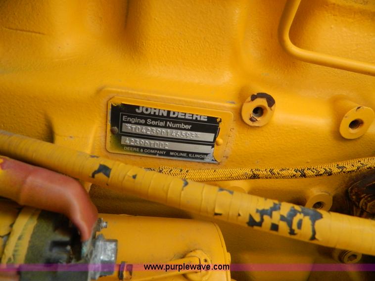 image for item D6116 1986 John Deere 210C backhoe