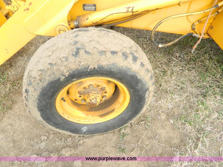 image for item D6116 1986 John Deere 210C backhoe