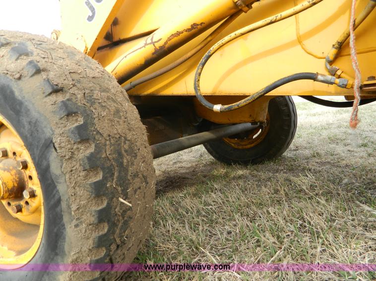 image for item D6116 1986 John Deere 210C backhoe