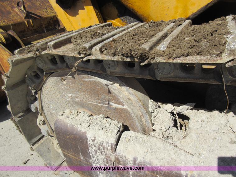 image for item F8387 International 250 track loader