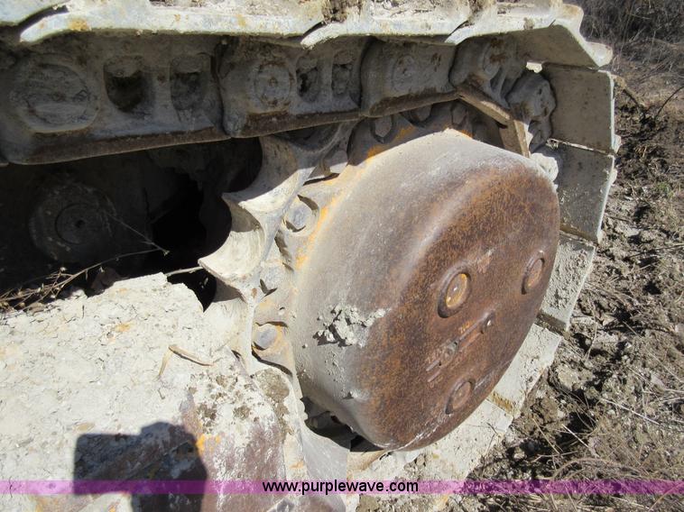 image for item F8387 International 250 track loader