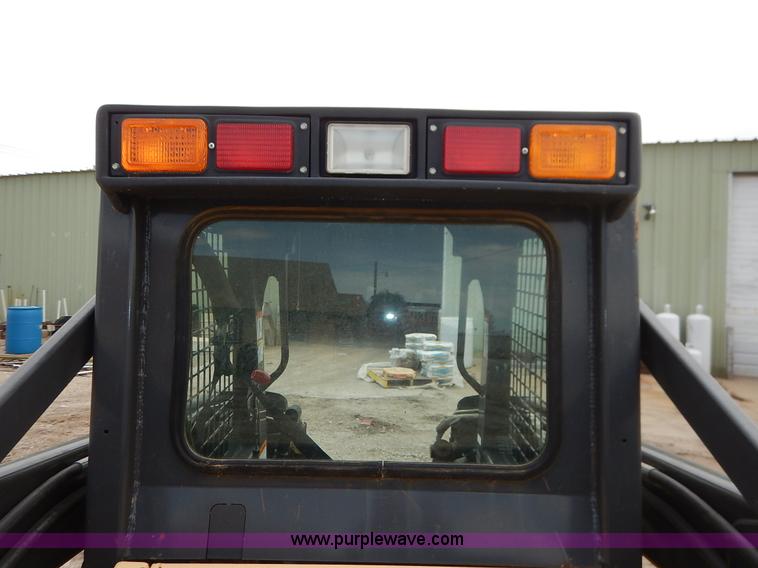 image for item I5006 2004 New Holland LS140 skid steer