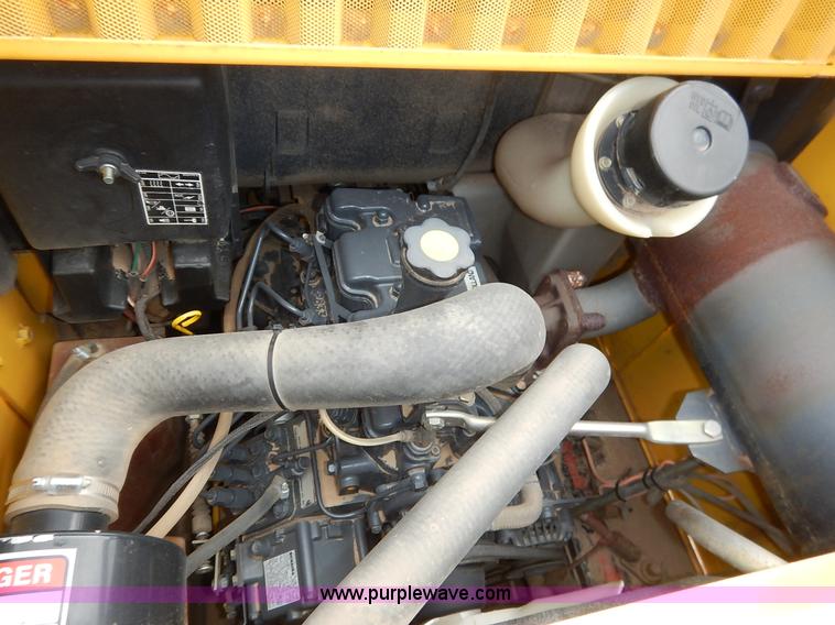 image for item I5006 2004 New Holland LS140 skid steer