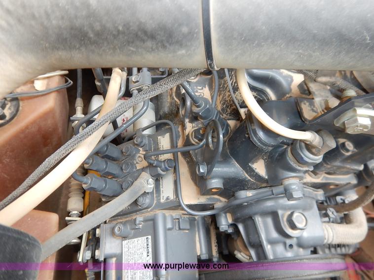 image for item I5006 2004 New Holland LS140 skid steer