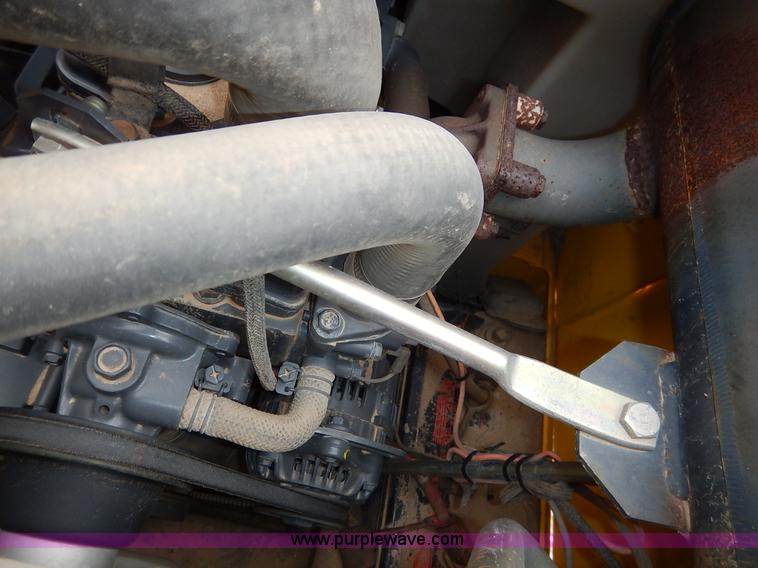 image for item I5006 2004 New Holland LS140 skid steer