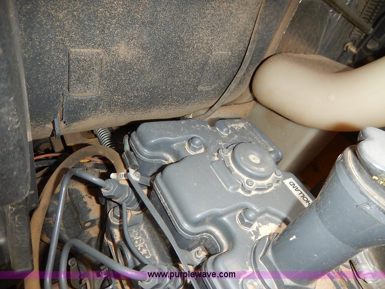 image for item I5006 2004 New Holland LS140 skid steer