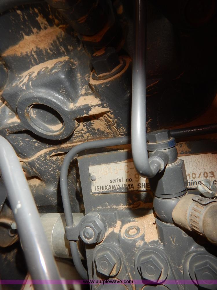 image for item I5006 2004 New Holland LS140 skid steer