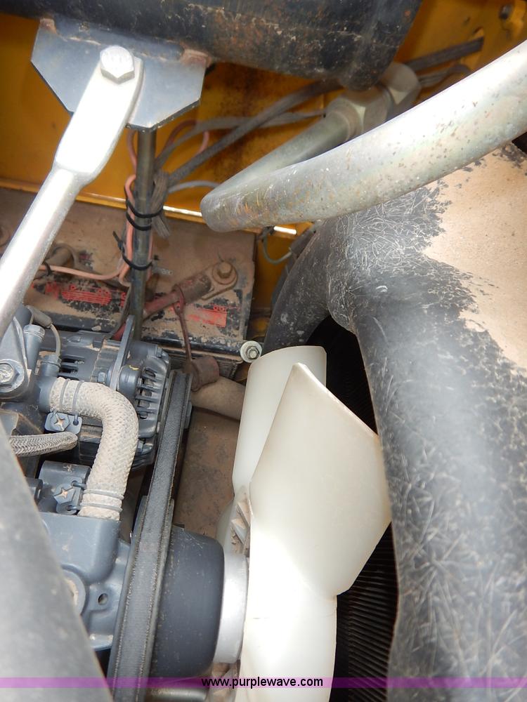 image for item I5006 2004 New Holland LS140 skid steer