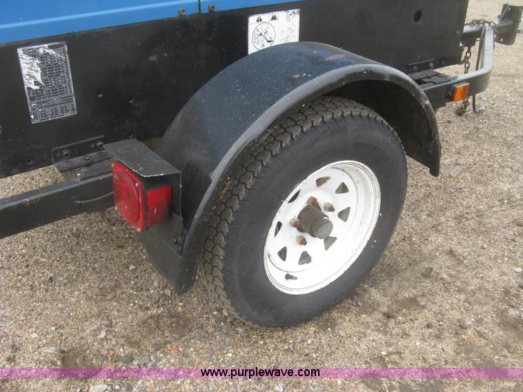 image for item K2960 2003 Miller Big Blue 302P welder/generator