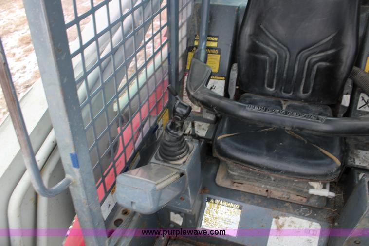 image for item L6716 2002 Takeuchi TL150 tracked skid steer