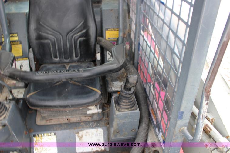 image for item L6716 2002 Takeuchi TL150 tracked skid steer