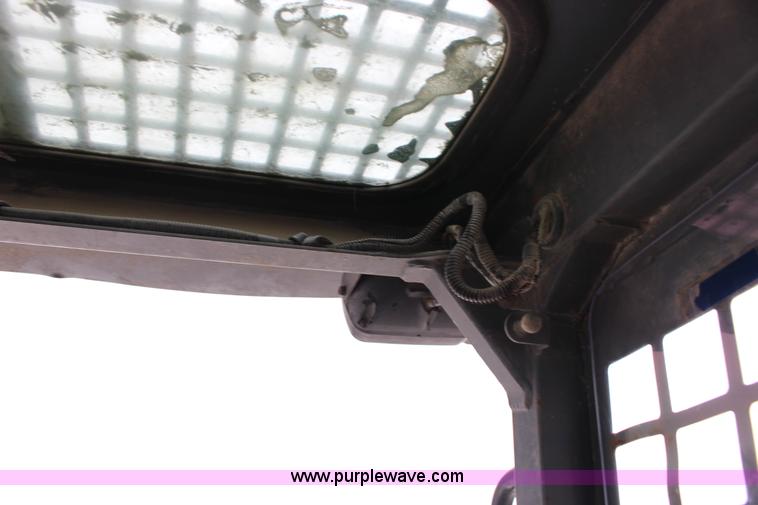 image for item L6716 2002 Takeuchi TL150 tracked skid steer