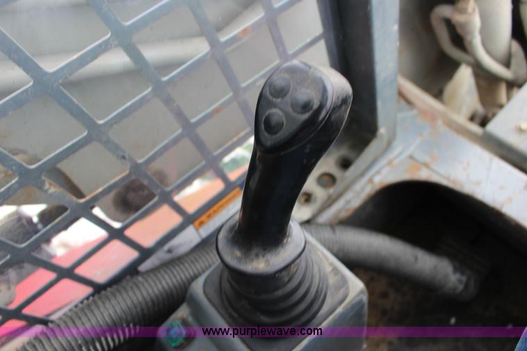 image for item L6716 2002 Takeuchi TL150 tracked skid steer