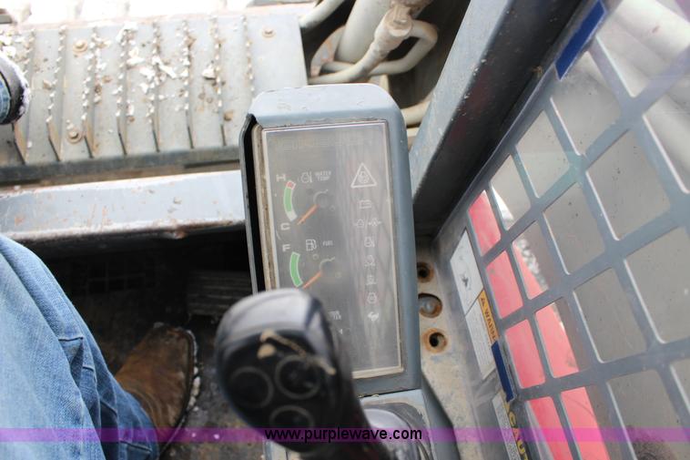 image for item L6716 2002 Takeuchi TL150 tracked skid steer