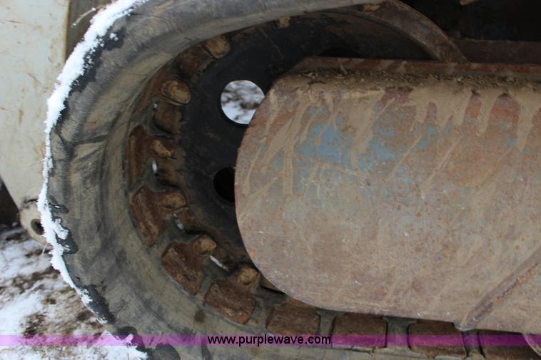 image for item L6716 2002 Takeuchi TL150 tracked skid steer