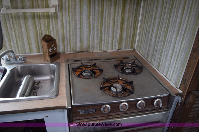 image for item K7245 1975 Dodge Sportsman camper