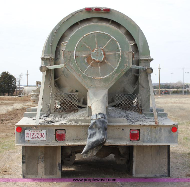 image for item J2270 2000 Mack RD690S rotating drum mixer truck