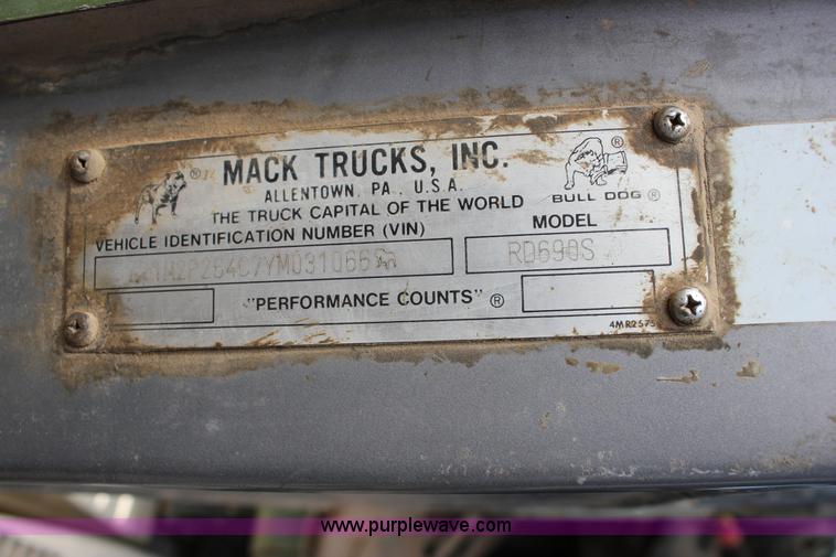 image for item J2270 2000 Mack RD690S rotating drum mixer truck