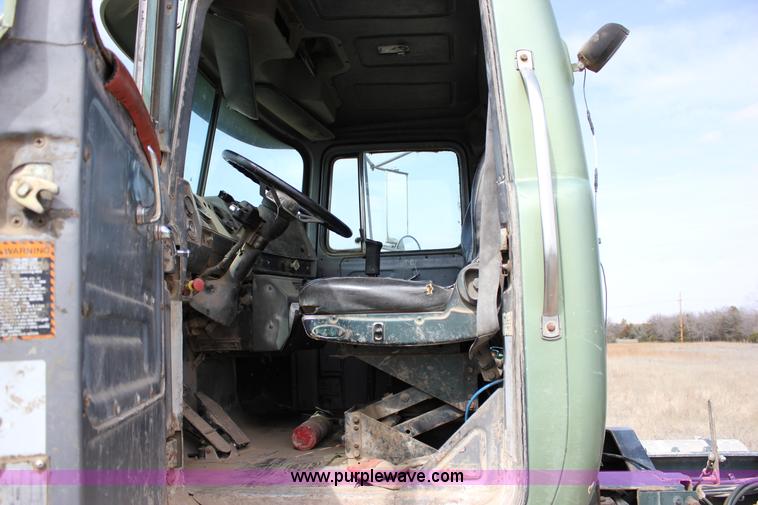 image for item J2270 2000 Mack RD690S rotating drum mixer truck