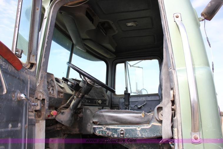 image for item J2270 2000 Mack RD690S rotating drum mixer truck