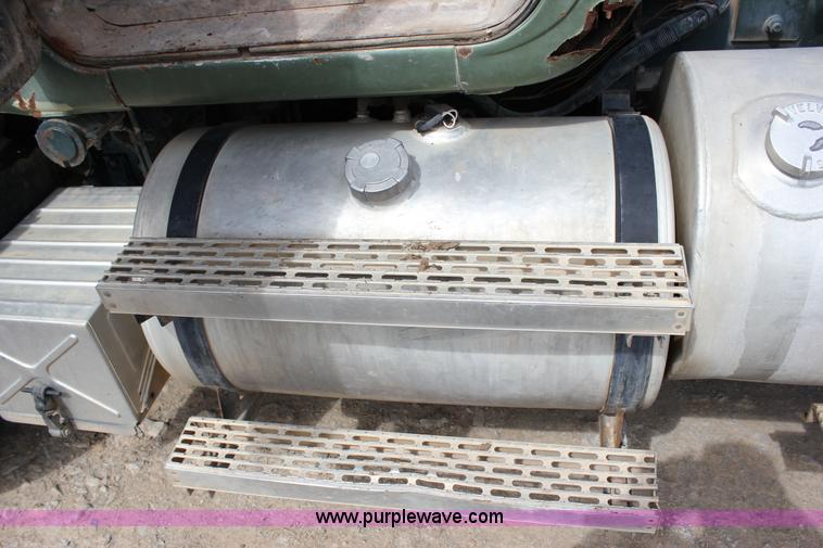 image for item J2270 2000 Mack RD690S rotating drum mixer truck