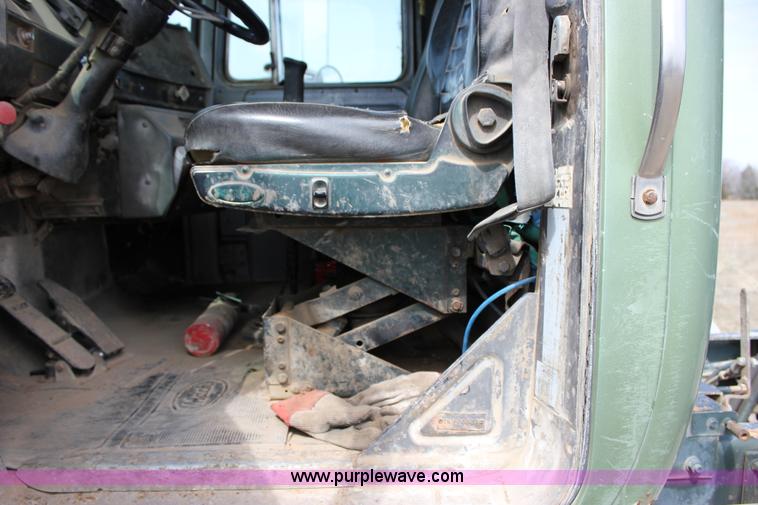 image for item J2270 2000 Mack RD690S rotating drum mixer truck