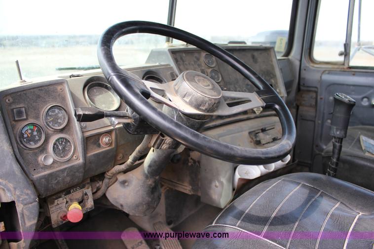 image for item J2270 2000 Mack RD690S rotating drum mixer truck