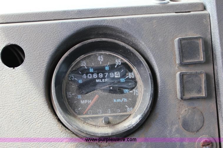 image for item J2270 2000 Mack RD690S rotating drum mixer truck