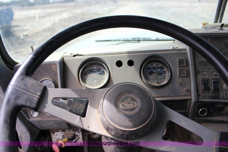 image for item J2270 2000 Mack RD690S rotating drum mixer truck