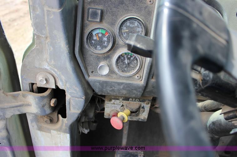 image for item J2270 2000 Mack RD690S rotating drum mixer truck