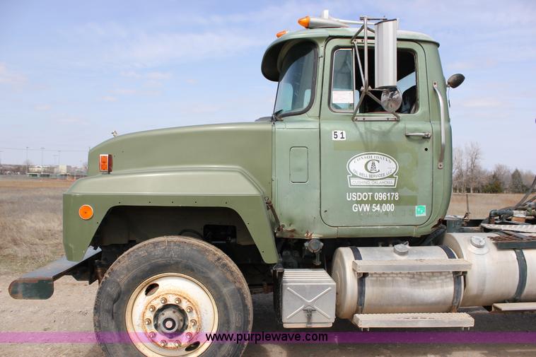 image for item J2270 2000 Mack RD690S rotating drum mixer truck