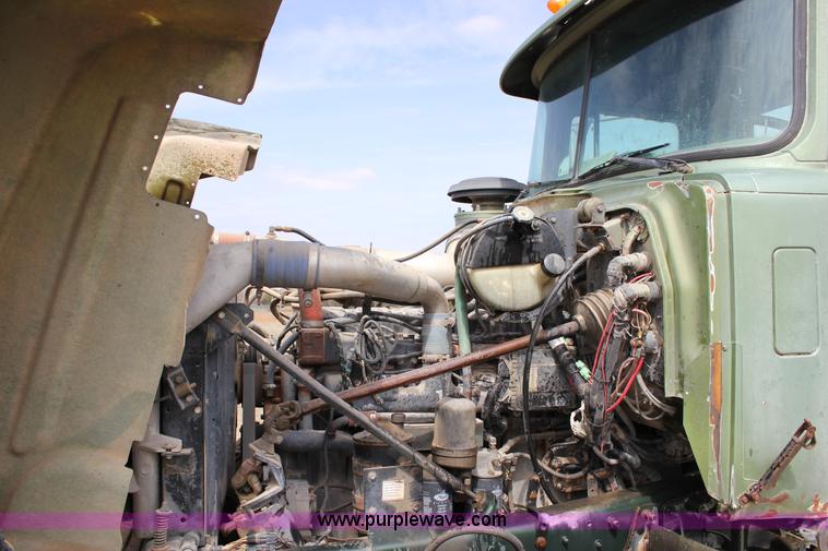 image for item J2270 2000 Mack RD690S rotating drum mixer truck