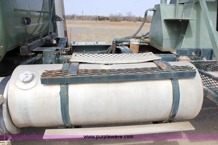 image for item J2270 2000 Mack RD690S rotating drum mixer truck