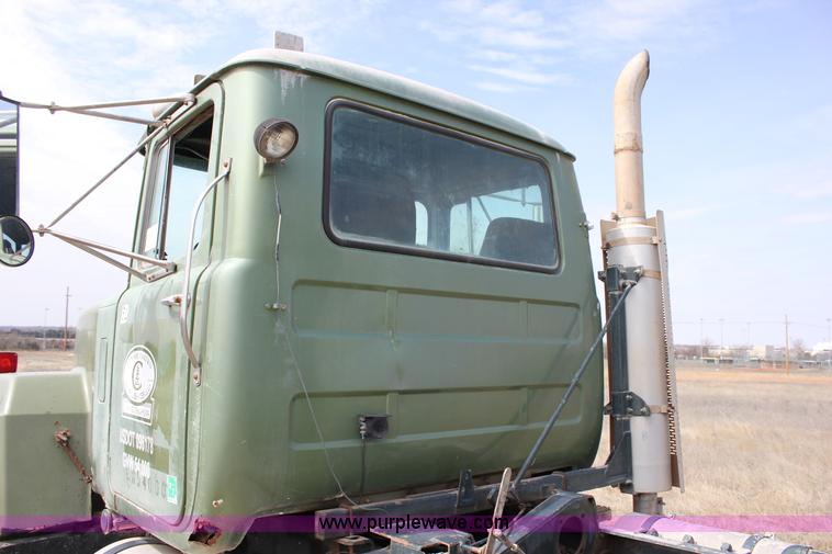 image for item J2270 2000 Mack RD690S rotating drum mixer truck