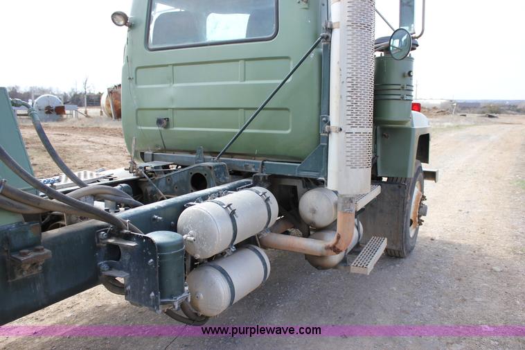 image for item J2270 2000 Mack RD690S rotating drum mixer truck