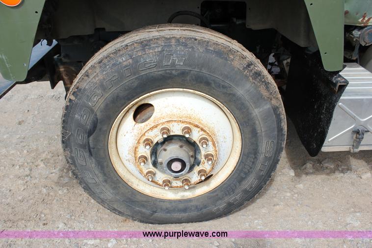 image for item J2270 2000 Mack RD690S rotating drum mixer truck