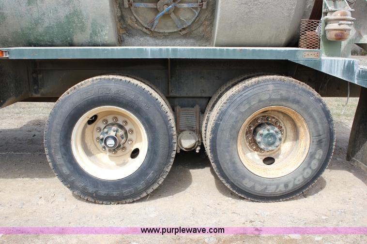 image for item J2270 2000 Mack RD690S rotating drum mixer truck