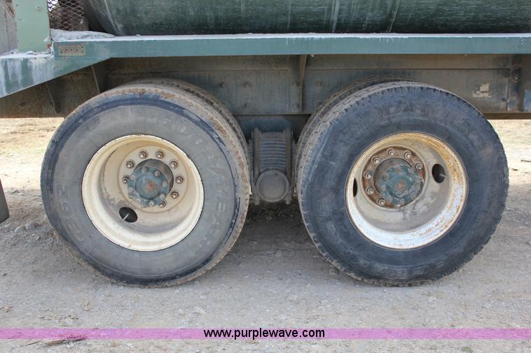 image for item J2270 2000 Mack RD690S rotating drum mixer truck