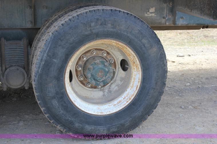 image for item J2270 2000 Mack RD690S rotating drum mixer truck