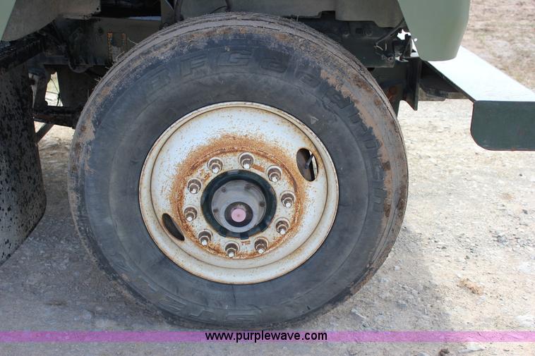 image for item J2270 2000 Mack RD690S rotating drum mixer truck