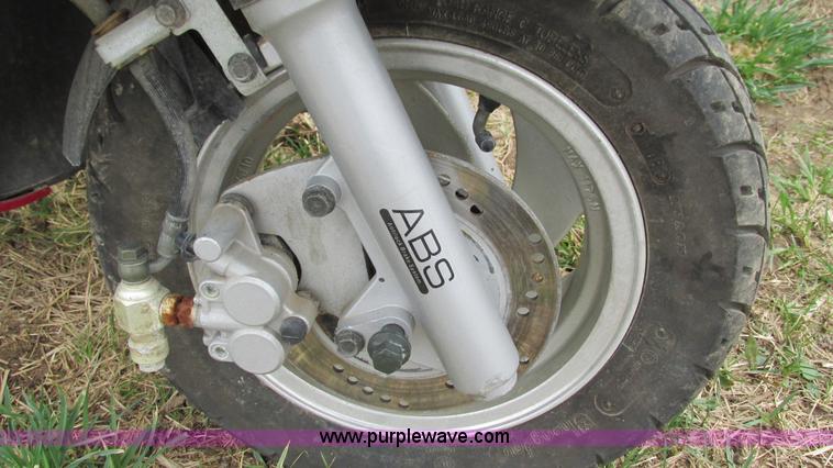 image for item AY9942 (3) wrecked motorcycles