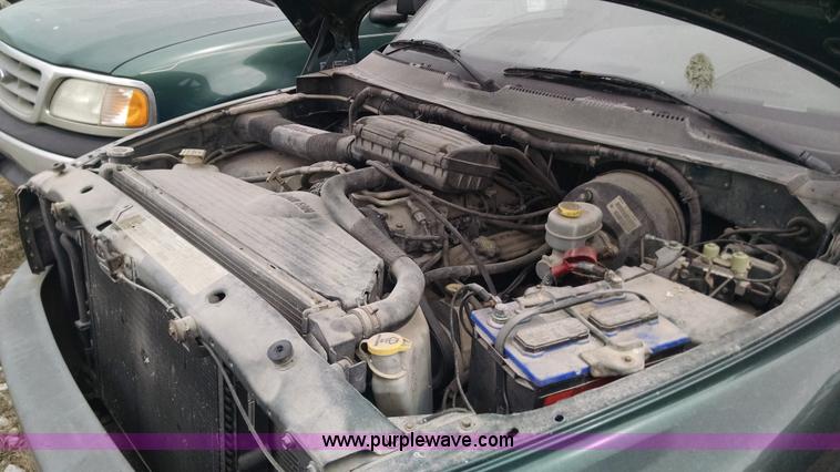 image for item F8432 1998 Dodge Ram 1500 Quad Cab pickup truck