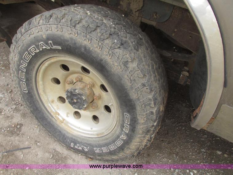 image for item H4715 2002 Ford F250 Super Duty XLT Crew Cab pickup truck