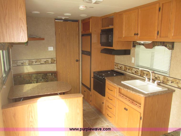 image for item H4731 2011 Heartland Trail Runner 22 camper