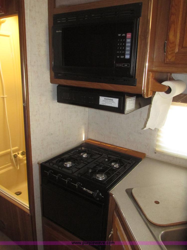 image for item H4735 1993 Ford Econoline E350 Dutchman 30' RV