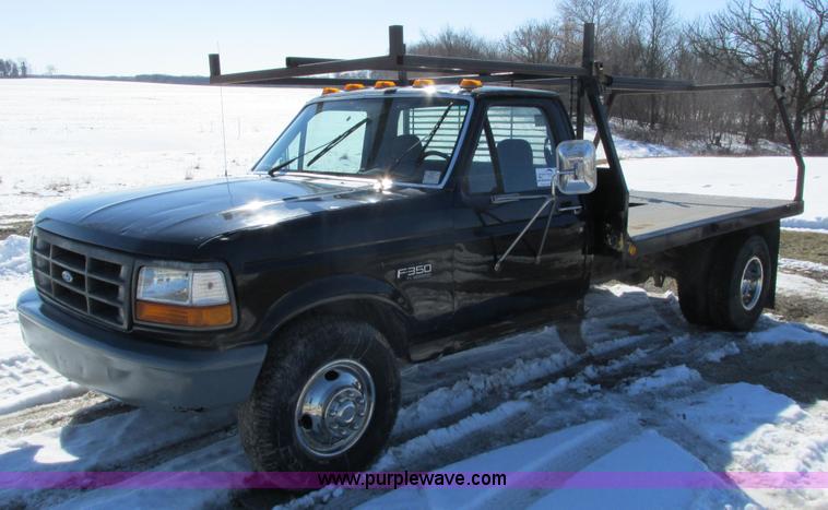 image for item I3768 1997 Ford F350 XL flatbed pickup truck